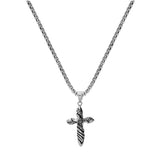 Collier acier patiné pendentif croix avec oxyde noir serti