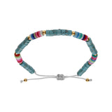 Bracelet acier cordon coulissant rondelles turquoise imitation et caoutchouc colorés