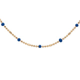 Collier plaqué or boules et résine bleu foncé