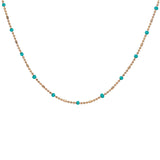 Collier plaqué or boules et résine vert turquoise