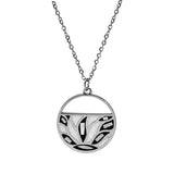 Collier acier pendentif rond résine et nacre blanche et noire