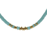 Collier acier rondelles turquoise imitation et boules dorées