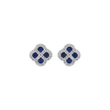 Boucles d'oreilles tige argent rhodié trefle verre bleu foncé contour oxydes blancs