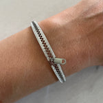 Bracelet acier rigide articulé avec fermeture éclair résine et strass - Olyci Bijoux