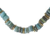 Collier acier doré rondelles coquillage teinté bleu