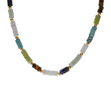 Collier acier rondelles sodalite, olivine, quartz, oeil de tigre véritable et turquoise imitation